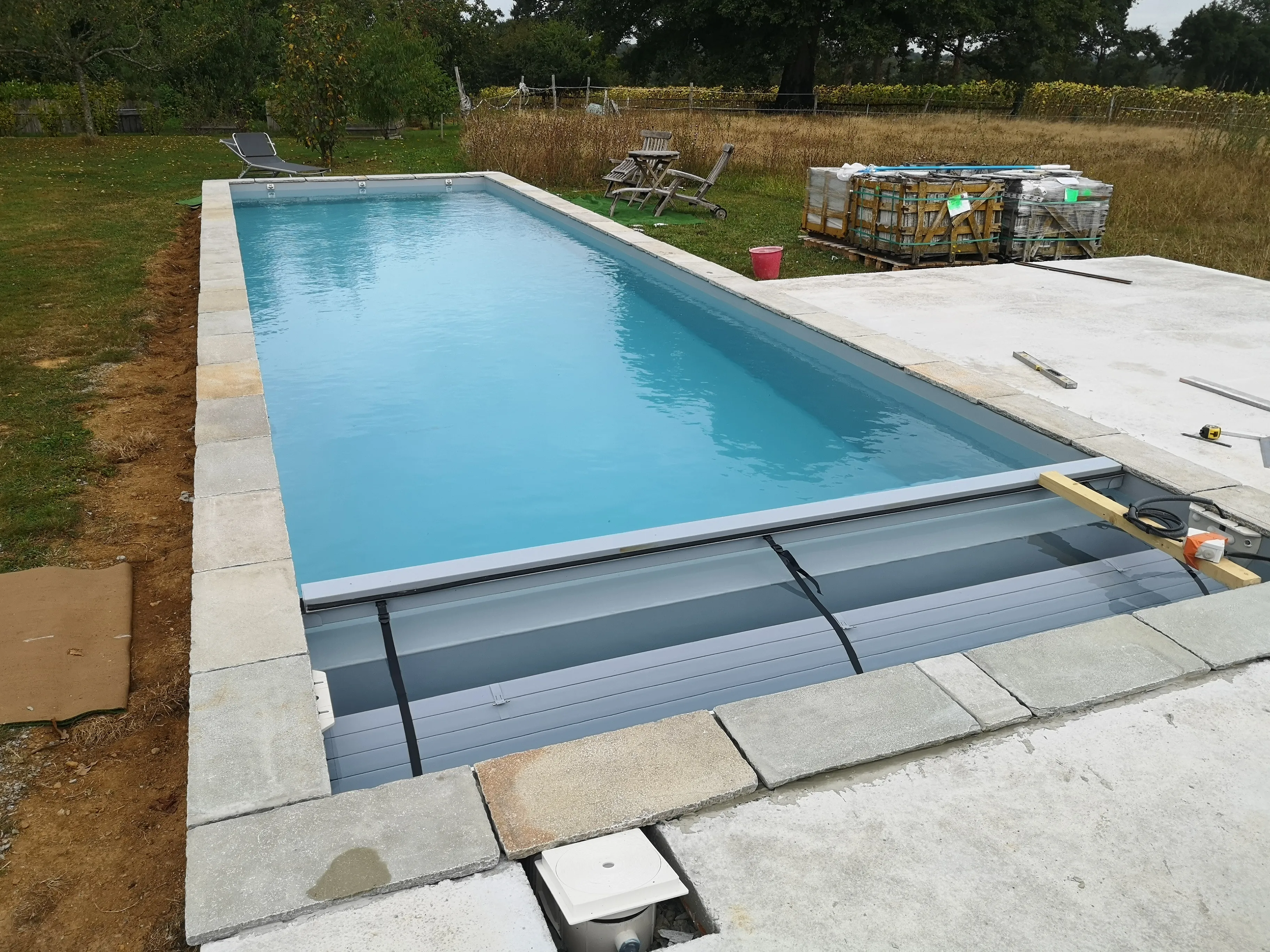 Remplissage de la piscine et installation de sécurité